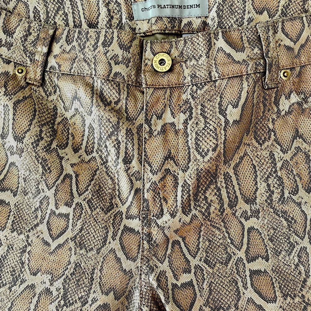 Chicos Worn Once! Platinum denim straight pants.